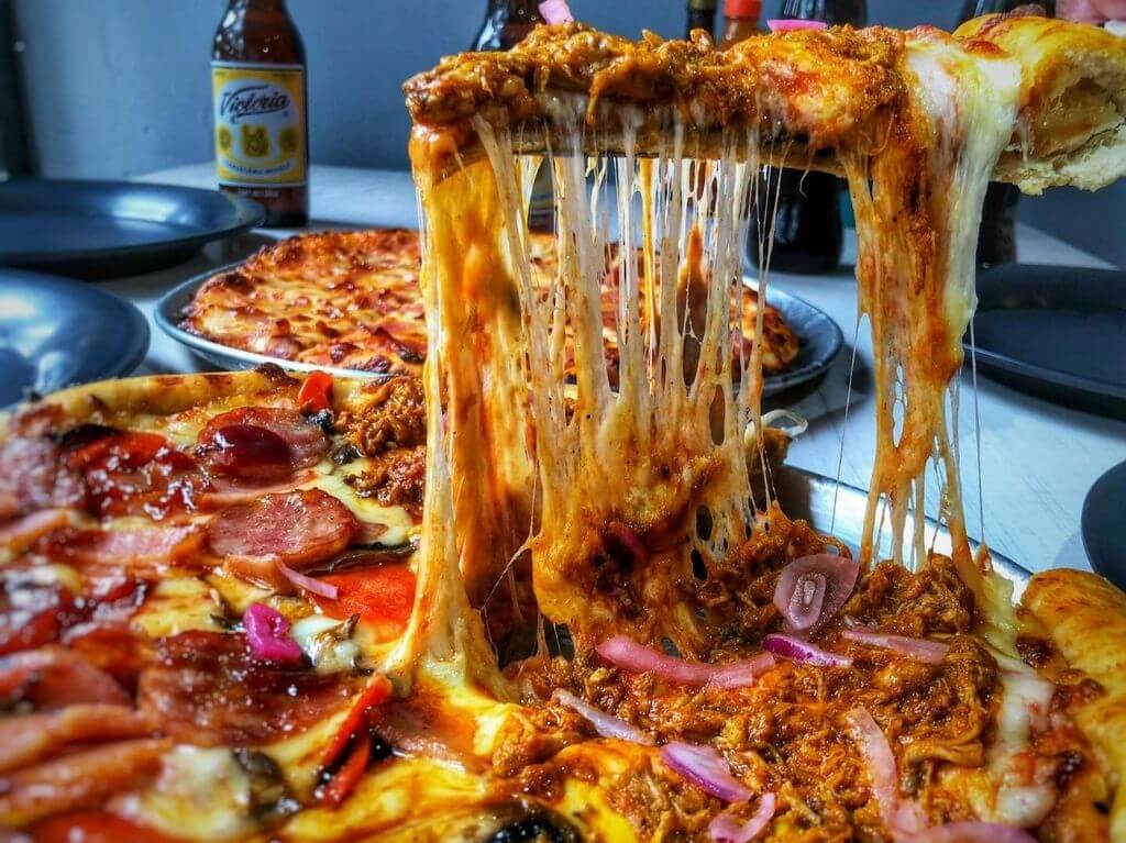 ¿En dónde se originó la deliciosa pizza?